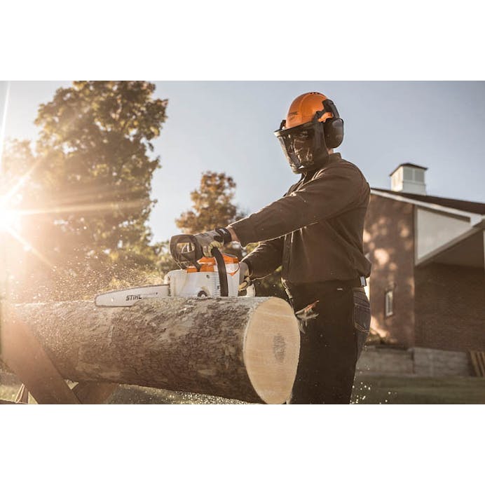 Man cutting log with Stihl C1 Light